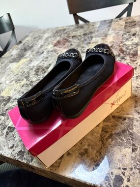 Xappeal Black Ballet Flats with Patent Accent and Chain Detail